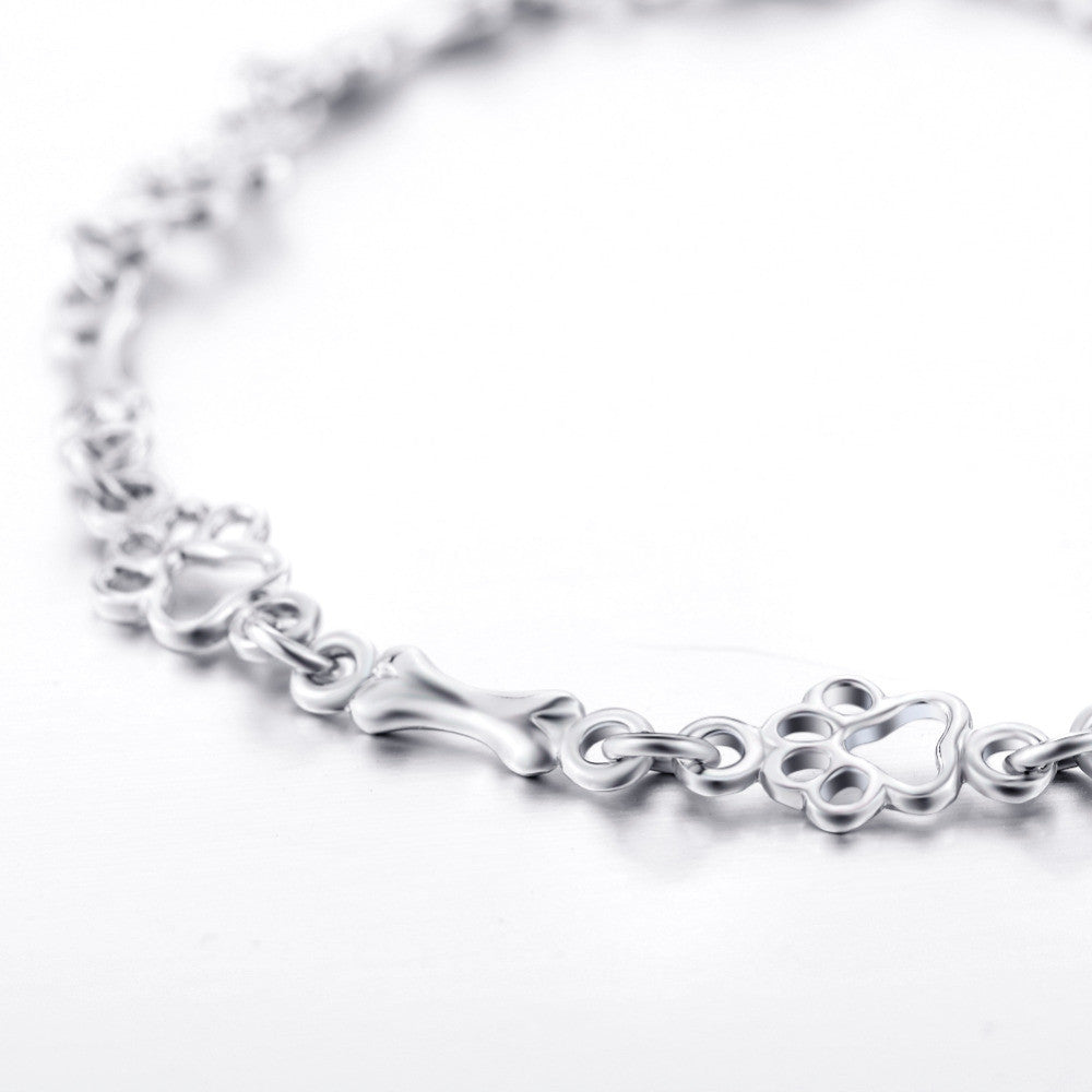 Bracelet with Dog Paw and Bone Charms Made of Pure Silver